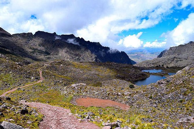 4-Day Lares Trek to Machu Picchu - Aguas Calientes: hot springs, a hotel, and a train ride