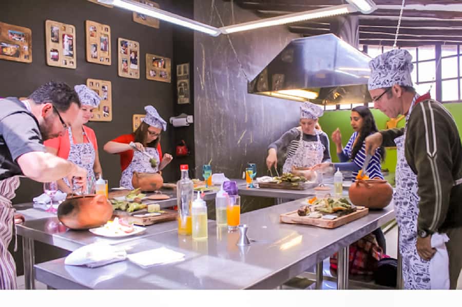 Cusco: Peruvian Cooking Class & Market Tour - Sitting down to eat what you prepared