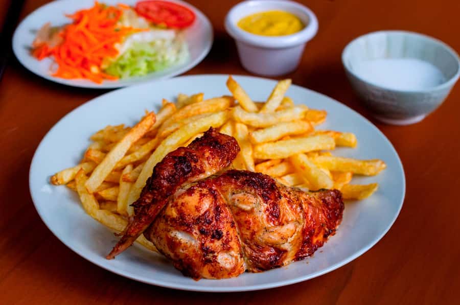 Cusco: Planetarium and Night Tour with Dinner and Pisco Sour - Dinner brings Pollo a la Brasa to the table