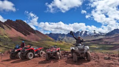 Mountain of colors and red valley on ATVs