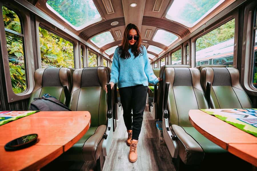From Cusco: Train Ride and Guided Tour of Machu Picchu - Arriving in Aguas Calientes and taking the uphill bus