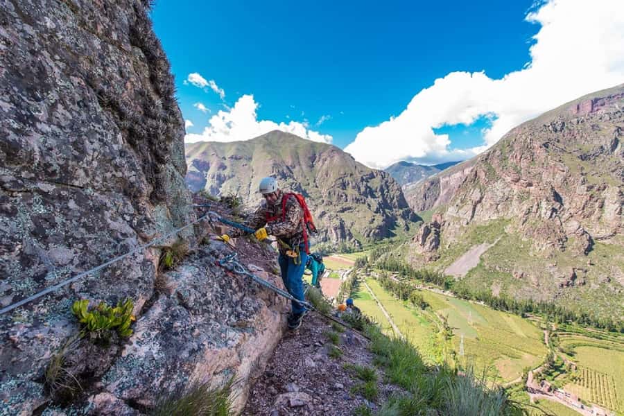 From Cusco: Via Ferrata & Zip Line with lunch - Getting fitted for the Via Ferrata at Pachar