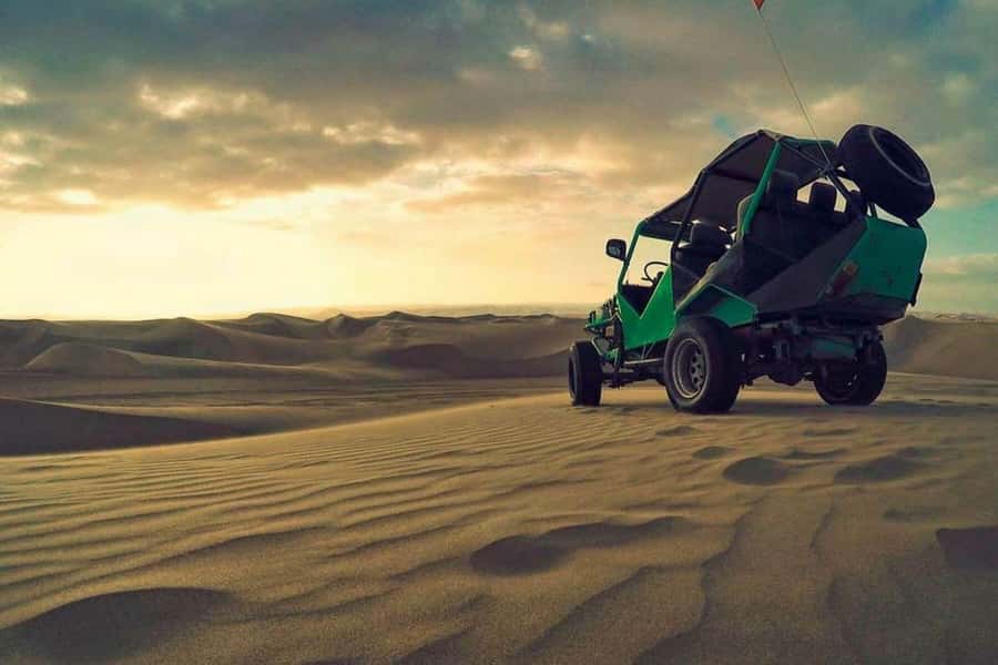 Huacachina: Dune Buggy & Sandboard | Huacachina Oasis | Ica - Sandboarding on the giant dunes