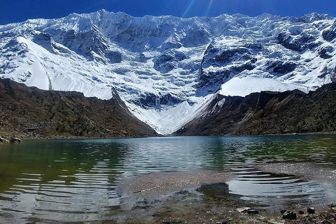 Humantay Lake Peru – Adventure Day Tour - Turquoise water beneath snow-capped peaks
