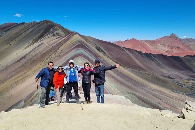 Vinicunca Rainbow Mountain Full-Day Tour from Cusco - Reaching the striped summit of Vinicunca
